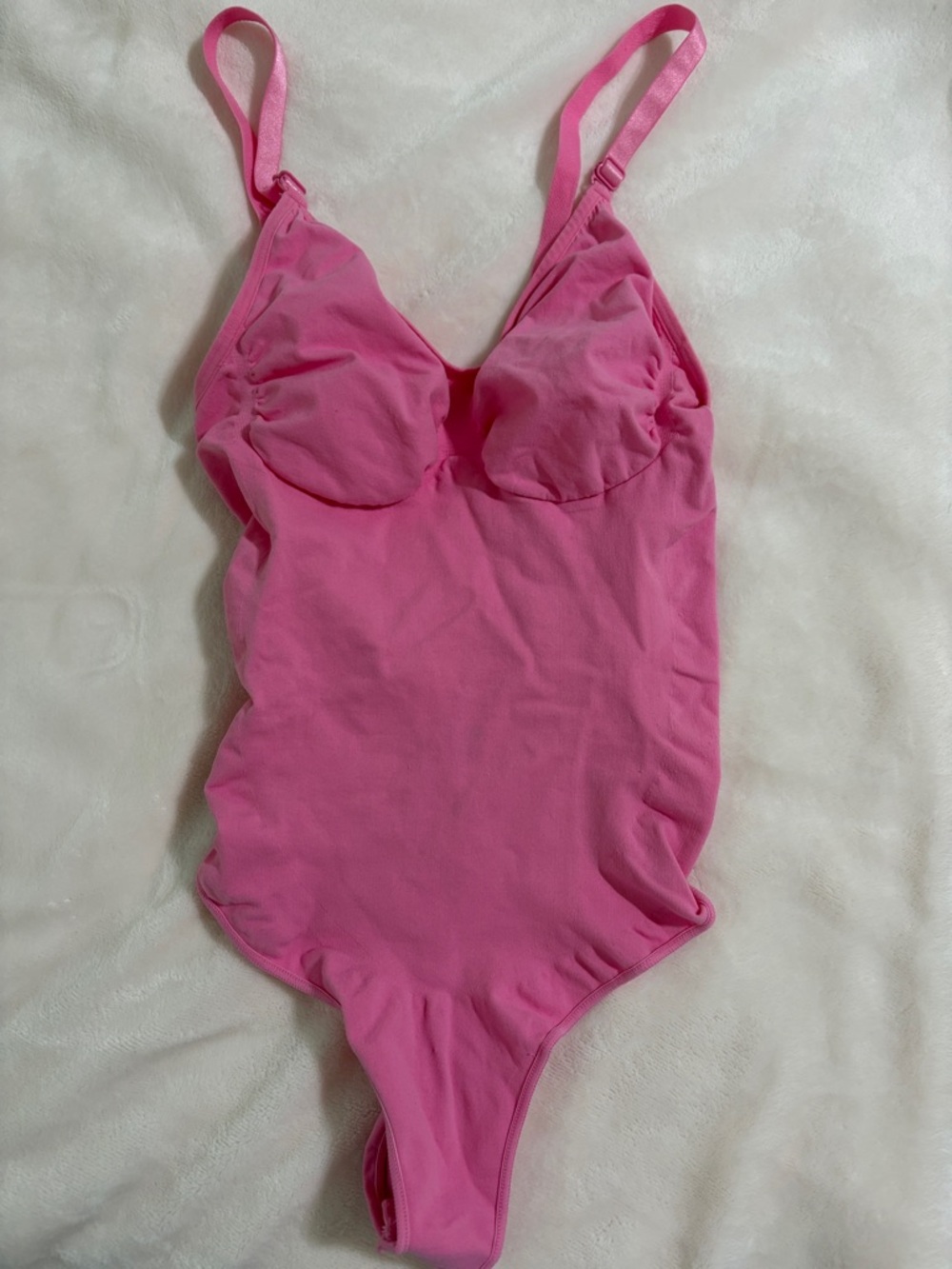 Pink contouring bodysuit